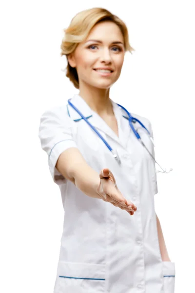 Woman doctor standing on white background — Stock Photo, Image