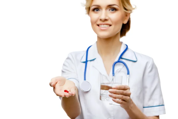 Woman doctor standing on white background — Stock Photo, Image