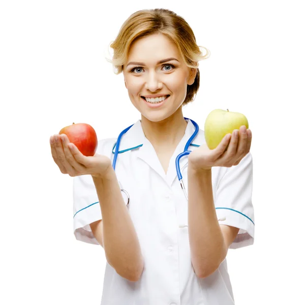 Mujer médico de pie sobre fondo blanco —  Fotos de Stock