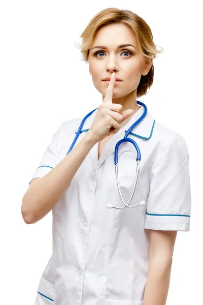 Женщина-врач на белом фоне — стоковое фото