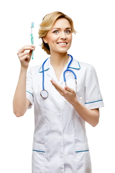 Woman doctor standing on white background — Stock Photo, Image