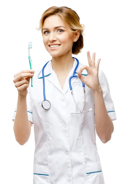 Woman doctor standing on white background — Stock Photo, Image