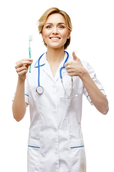 흰색 바탕에 서 있는 여자 의사 — 스톡 사진