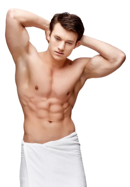 Handsome young man sniffing his armpit — Stock Photo, Image