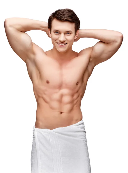 Handsome young man sniffing his armpit — Stock Photo, Image