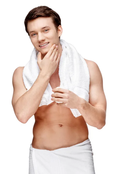 Handsome young man sniffing his armpit — Stock Photo, Image