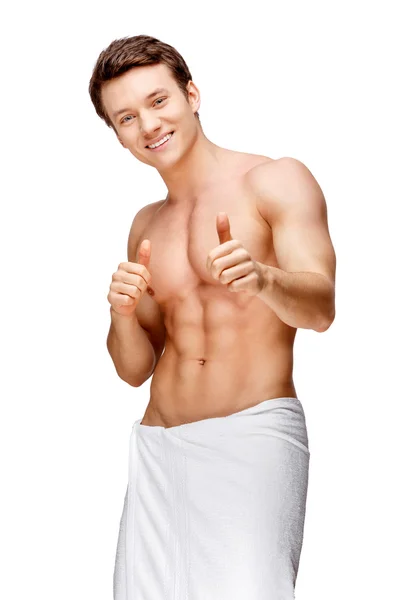 Handsome young man sniffing his armpit — Stock Photo, Image