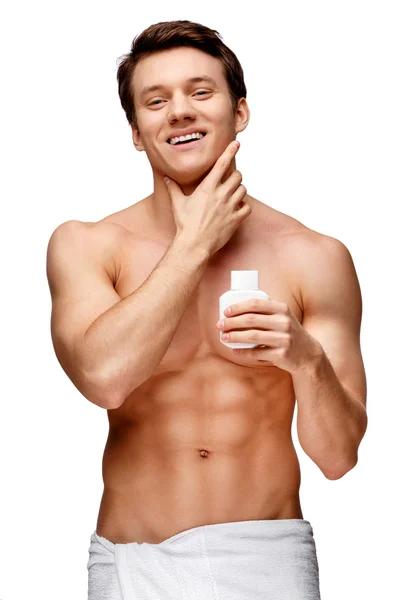 Handsome young man sniffing his armpit — Stock Photo, Image