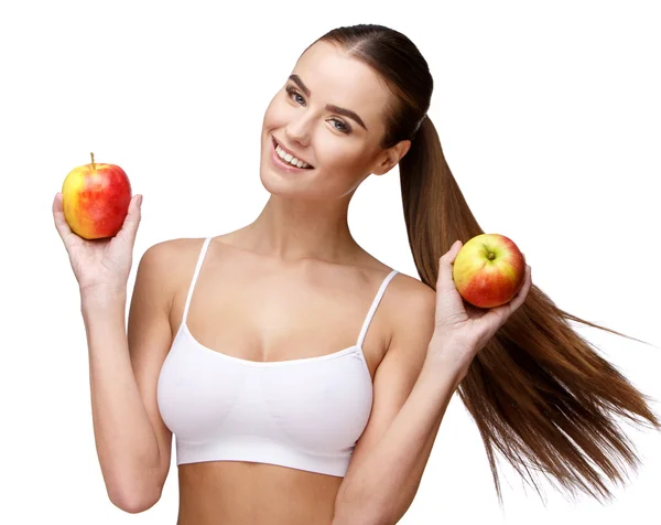 Portrait of attractivesmiling woman holding apple isolated on white — Stock Photo, Image