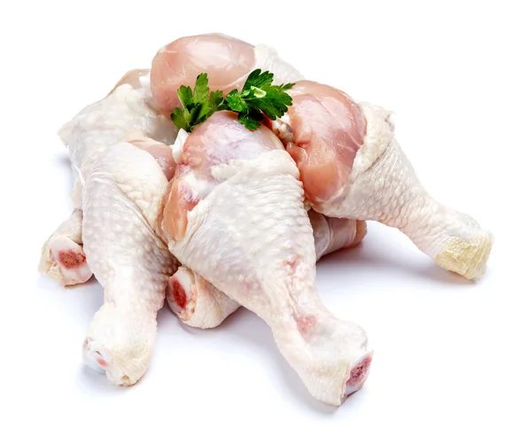 Rohe Hühnerkeulen auf weißem Hintergrund — Stockfoto