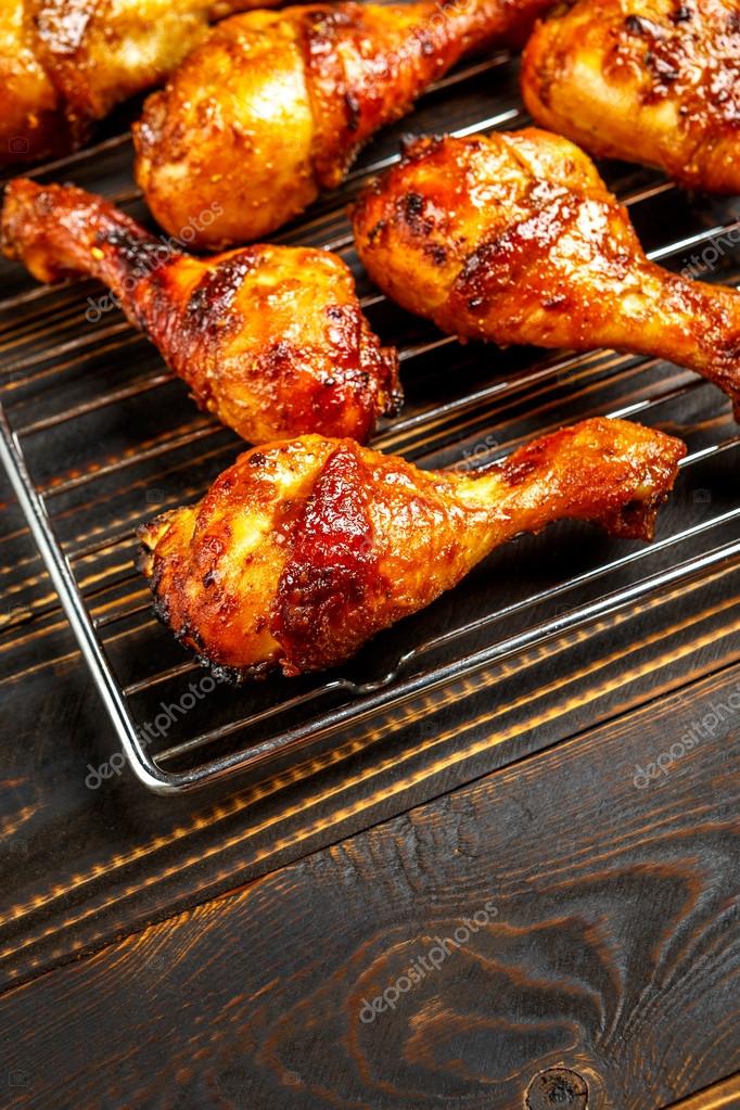 Grilled chicken legs on the grill Stock Photo by ©repinanatoly 122363248