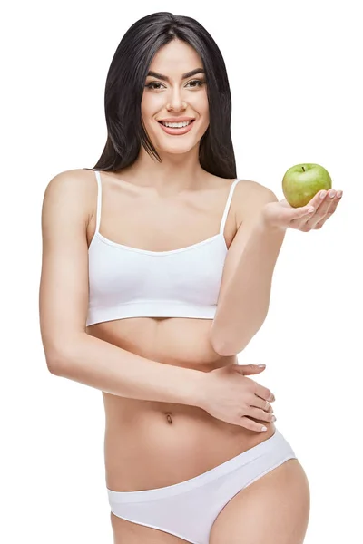 Portrait of attractivesmiling woman holding apple isolated on white — Stock Photo, Image