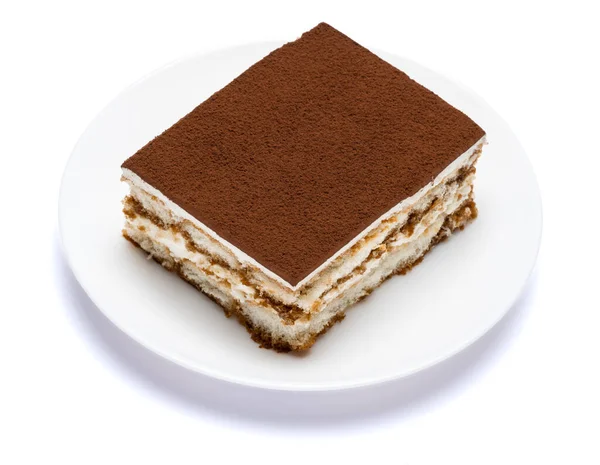 Traditionnel italien Tiramisu portion de dessert carré sur plaque en céramique isolée sur fond blanc avec chemin de coupe — Photo