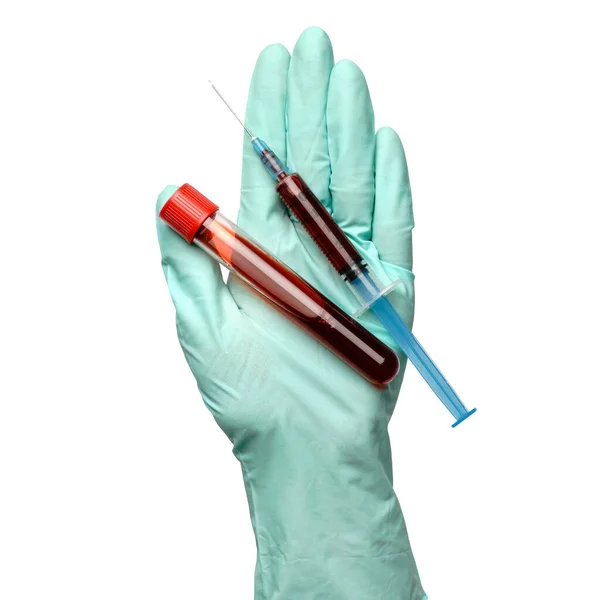 Hand in latex glove holding blood sample in test tube and syringe close up isolated on white background — Stock Photo, Image