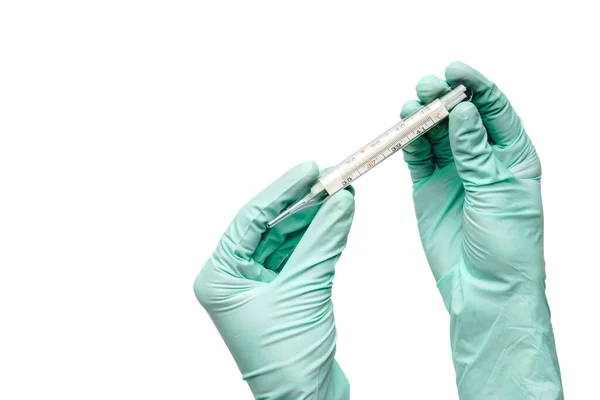 Close up hand in a latex glove with thermometer isolated on a white background — Stock Photo, Image