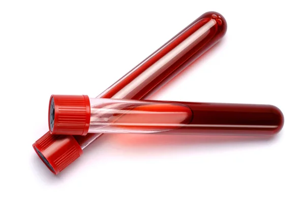 Testovací trubice s červenou zástrčkou izolované na bílém pozadí s oříznutou dráhou — Stock fotografie
