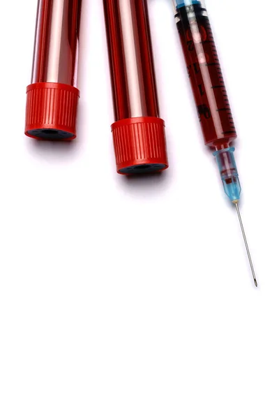 Medical syringe and plastic test tube isolated on white background — Stock Photo, Image