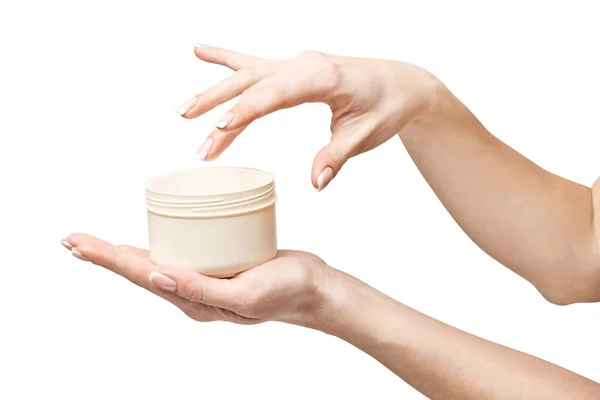 Hand holding plastic can of cream Isolated on a white background — Stock Photo, Image