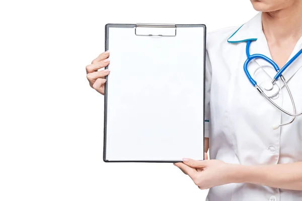 Beautiful female doctor holding clipboard isolated on white background Stock Picture