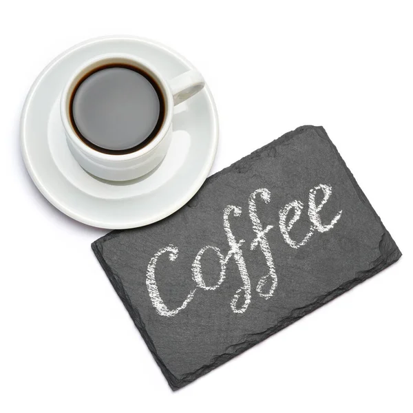 Letrero de inscripción manuscrita en color café sobre pizarra y taza de espresso sobre fondo blanco — Foto de Stock