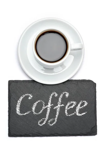 Segno di iscrizione manoscritta caffè su lavagna di gesso e tazza di espresso su sfondo bianco — Foto Stock
