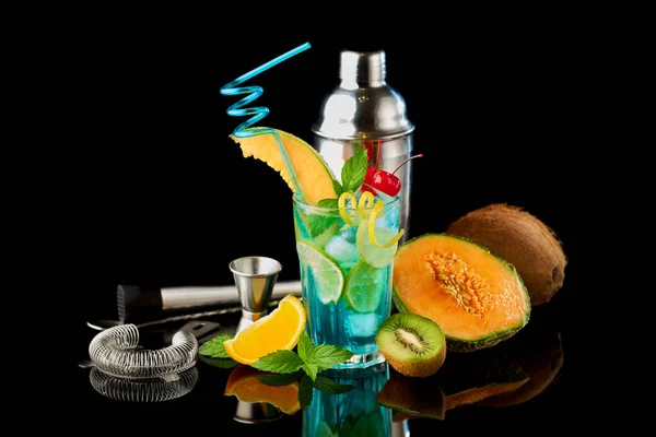 Blue Lagoon cocktail with a slice of melon and cherry isolated on white — Stok Foto