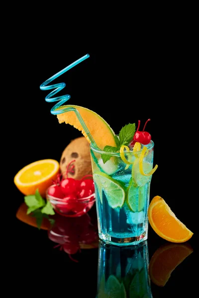 Blue Lagoon cocktail with a slice of melon and cherry isolated on white — Stock Photo, Image