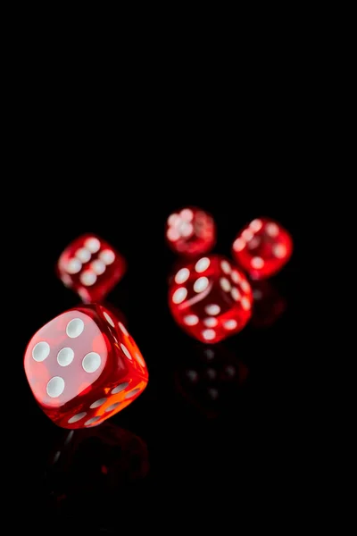 Red and white craps or dices on reflective black background — Stock Photo, Image