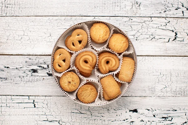 Bisquits on wooden background — Stock Photo, Image