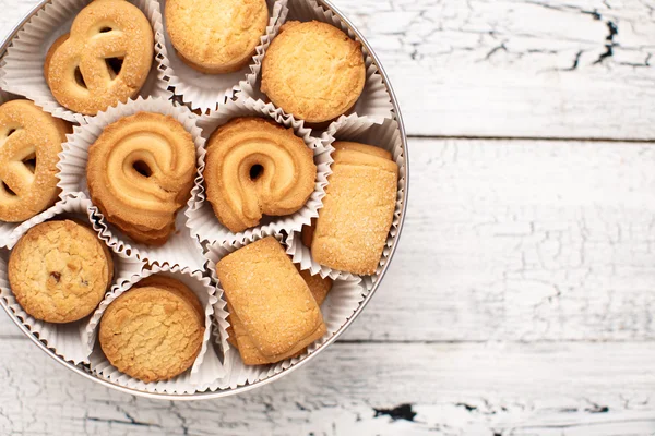 Bisquits on wooden background — Stock Photo, Image