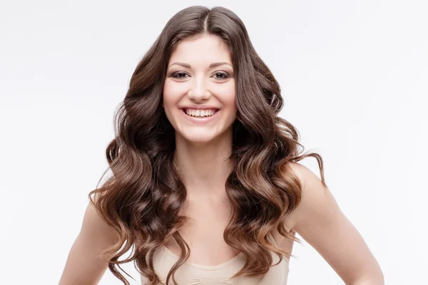 Beautiful Woman with curly brown hair — Stock Photo, Image