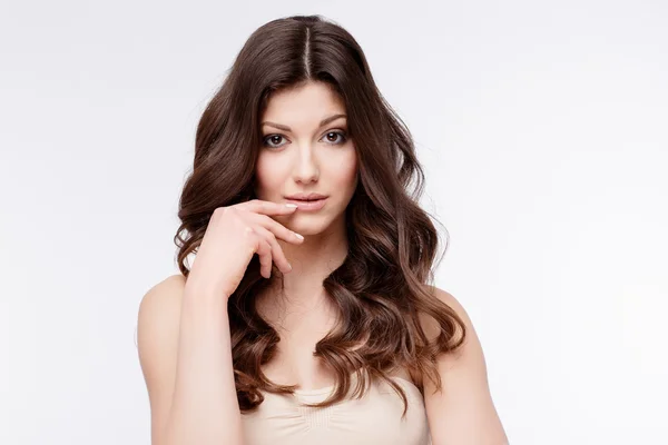 Beautiful Woman with curly brown hair — Stock Photo, Image