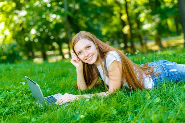 Beautiful smiling red-haired young woman — Stock Photo, Image