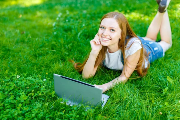 Beautiful smiling red-haired young woman — Stock Photo, Image