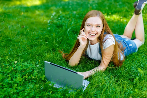 Beautiful smiling red-haired young woman — Stock Photo, Image