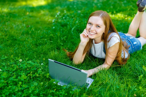 Beautiful smiling red-haired young woman — Stock Photo, Image