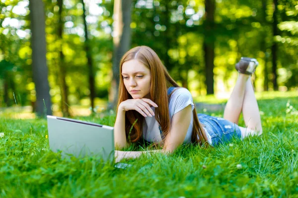 Beautiful smiling red-haired young woman — Stock Photo, Image