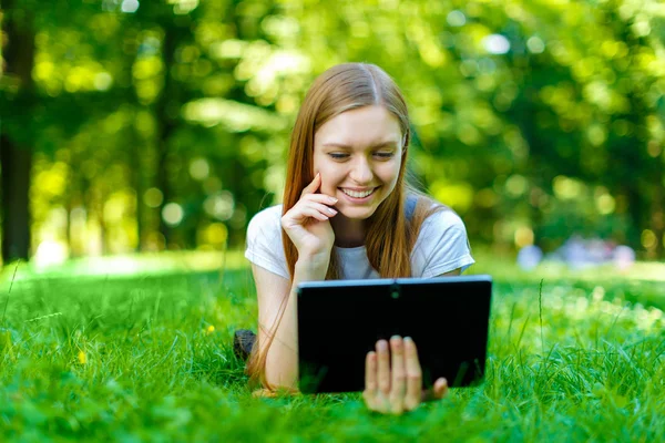 Beautiful smiling red-haired young woman — Stock Photo, Image