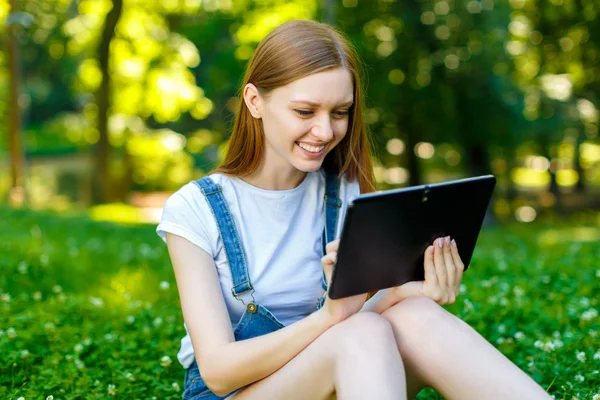 Beautiful smiling red-haired young woman — Stock Photo, Image