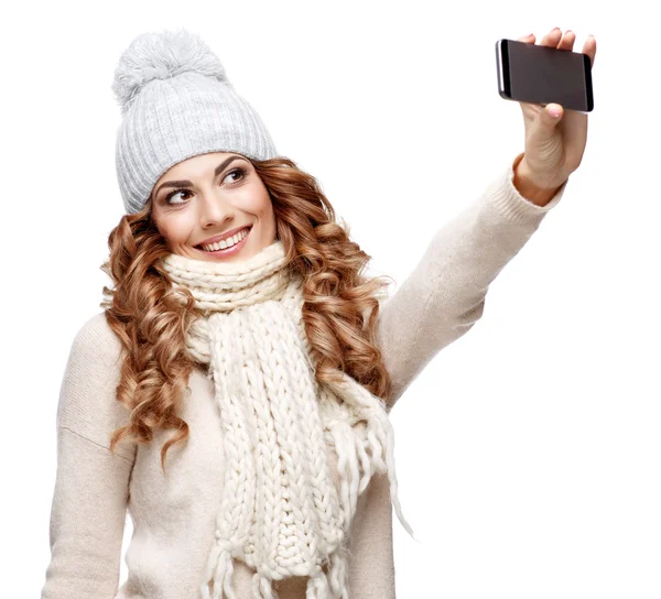 Beautiful young woman in knitted wool sweater smiling — Stock Photo, Image