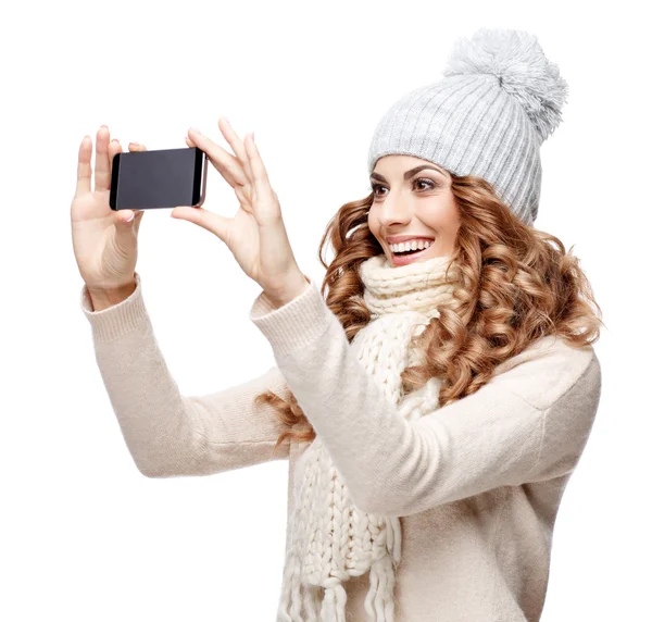 Beautiful young woman in knitted wool sweater smiling — Stock Photo, Image