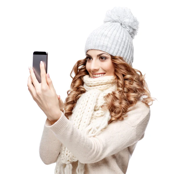 Beautiful young woman in knitted wool sweater smiling — Stock Photo, Image