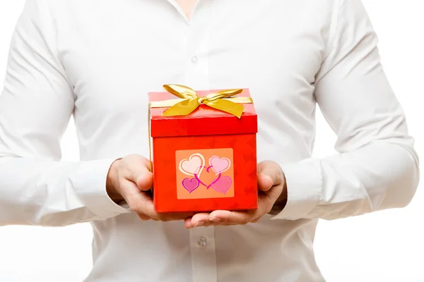 Young man carries heart shaped box — Stock Photo, Image