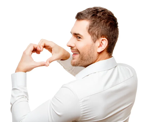 Joven mostrando el corazón por las manos — Foto de Stock