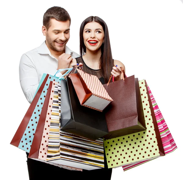 Casal com sacos de compras — Fotografia de Stock