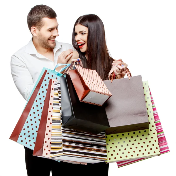 Pareja con bolsas de compras — Foto de Stock