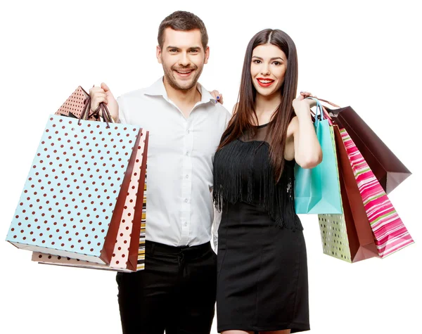 Pareja con bolsas de compras — Foto de Stock