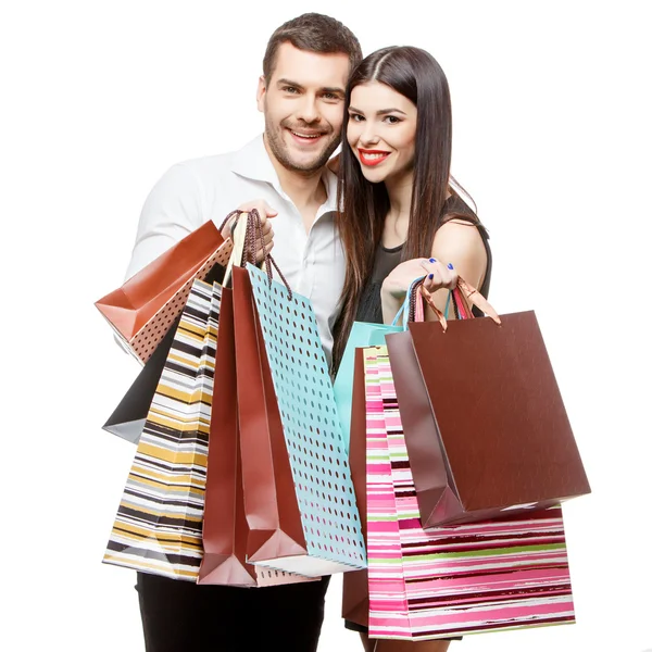 Pareja con bolsas de compras — Foto de Stock