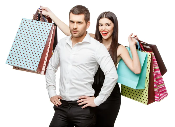 Pareja con bolsas de compras —  Fotos de Stock