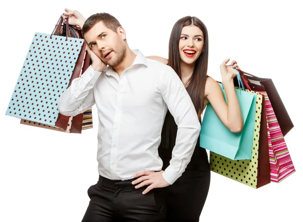 Pareja con bolsas de compras — Foto de Stock